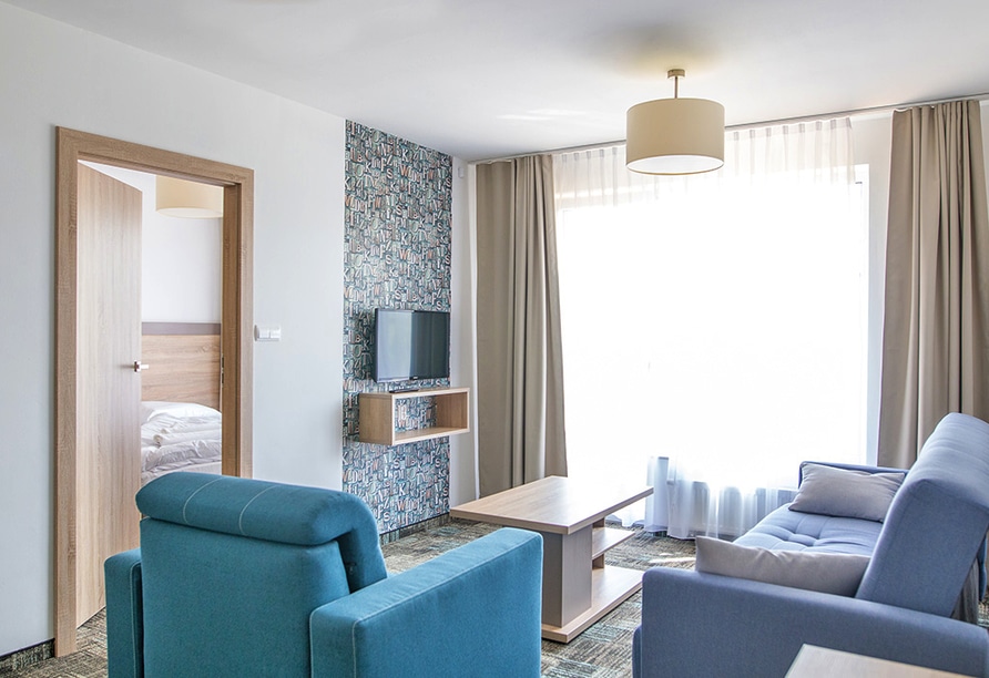 Geräumiges Familienzimmer im Hotel Siesta, ideal für Silvesterfeiern.