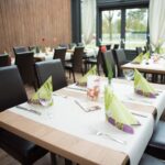 Festlich gedecktes Restaurant für das Silvester Dinner im Hotel zur Heideblüte