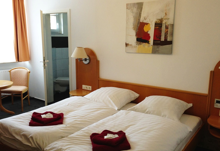 Gemütliches Hotelzimmer im Hotel Jägerstuben, ausgestattet für den Silvesteraufenthalt.