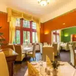 Festlich gedecktes Restaurant im Hotel Waldschlösschen, perfekt für das Silvester-Dinner