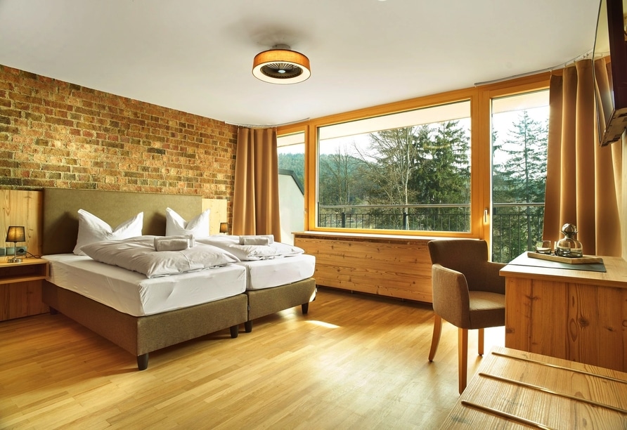 Gemütliches Doppelzimmer im Das Dreiburgensee Naturhotel ideal für Silvester