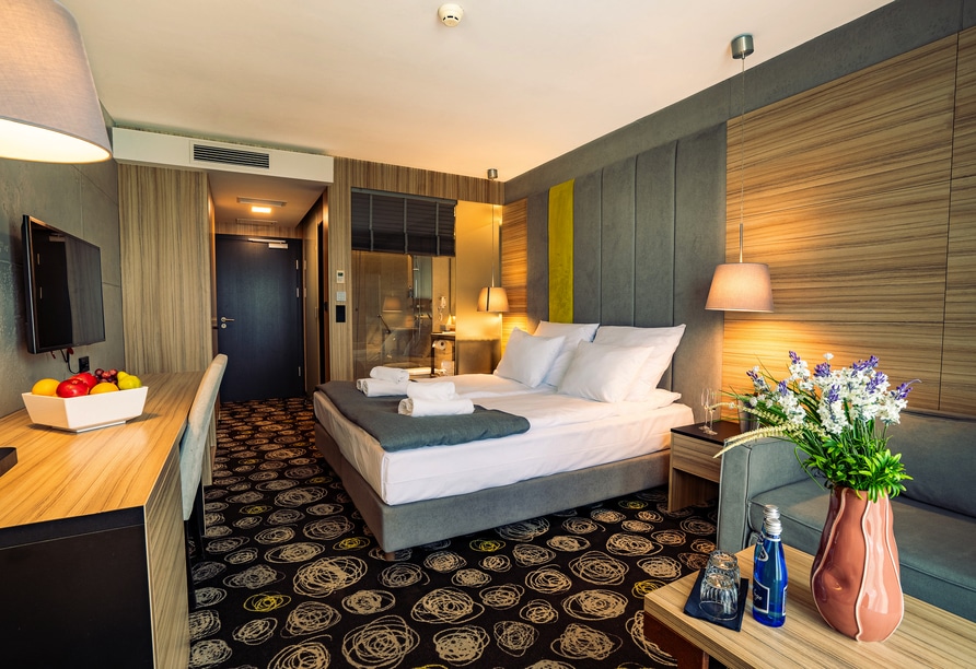 Elegant eingerichtetes Deluxe-Zimmer im Hotel Mielenko & Spa, perfekt für einen luxuriösen Silvesteraufenthalt.