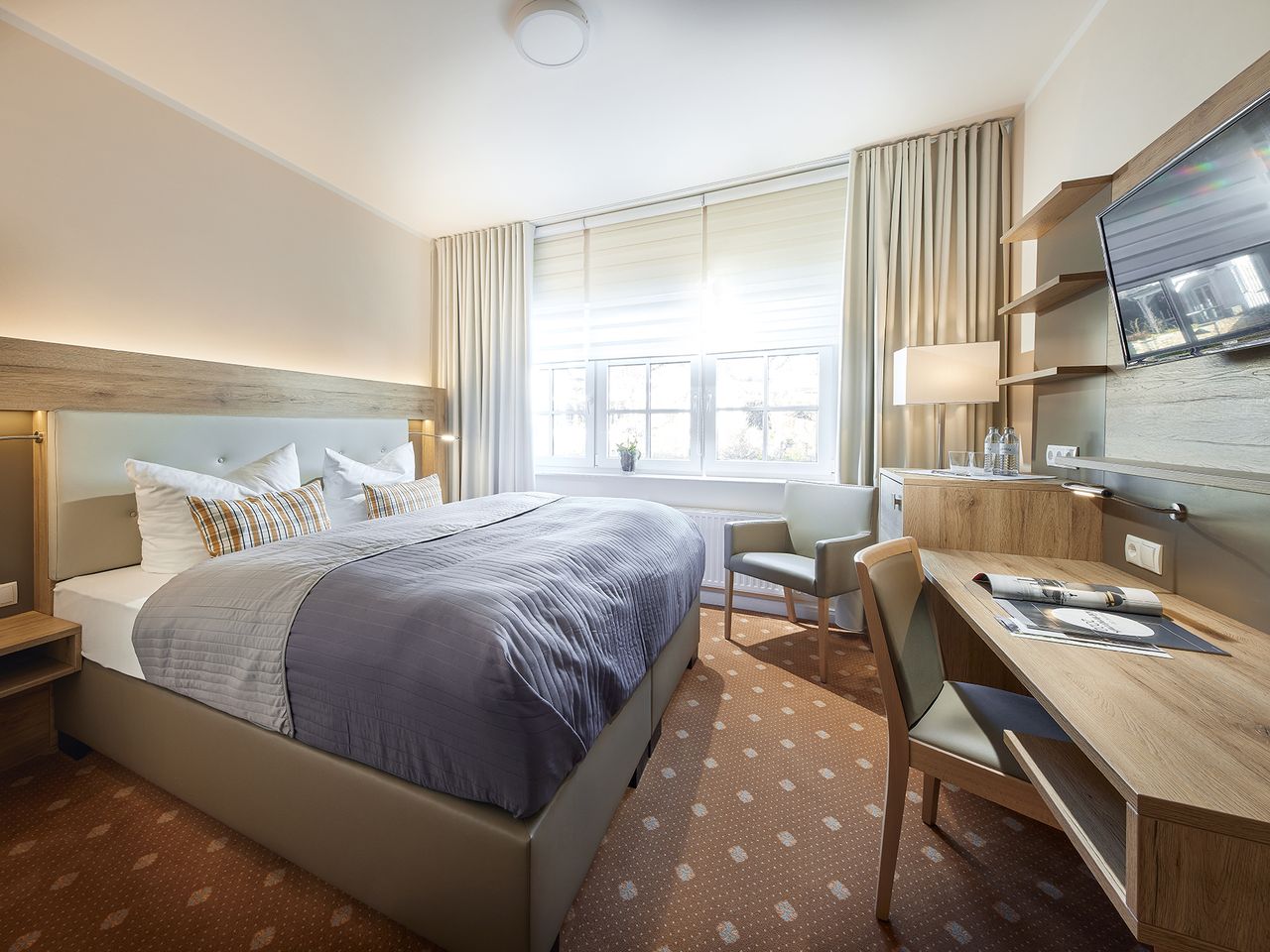 Modern eingerichtetes Zimmer im Struck Landhotel & SPA zu Silvester